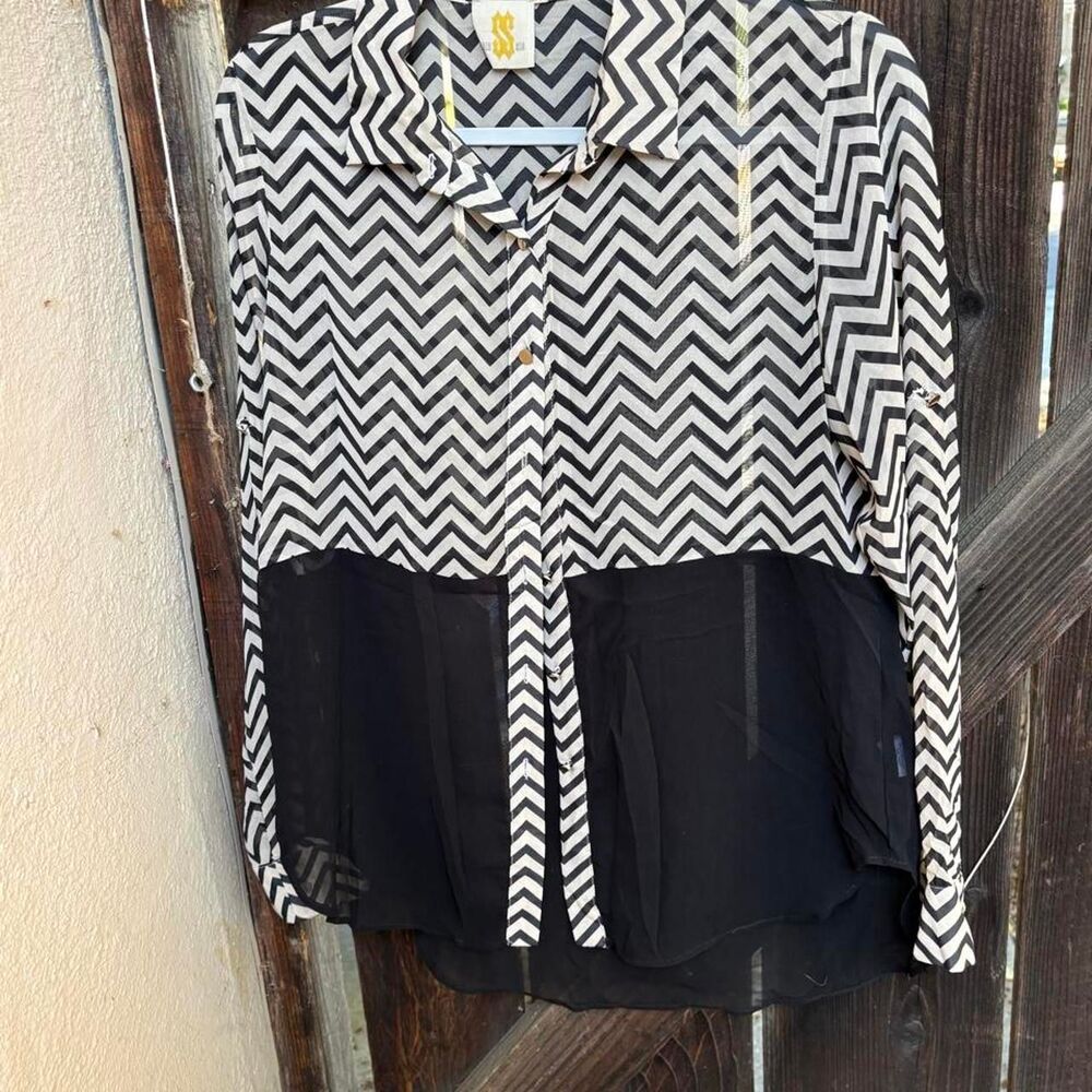 black and white chevron-patterned long-sleeve button-down blouse